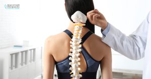 Chiropractor treating spine headaches and migraine causes in Michigan